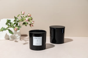 Luxury oud scented candle in a black jar
