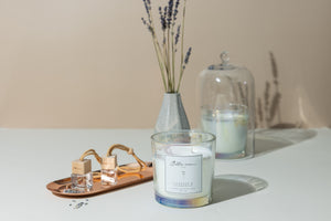 lavender & chamomile scented candle clear vessel with lavender flowers and wooden car diffusers
